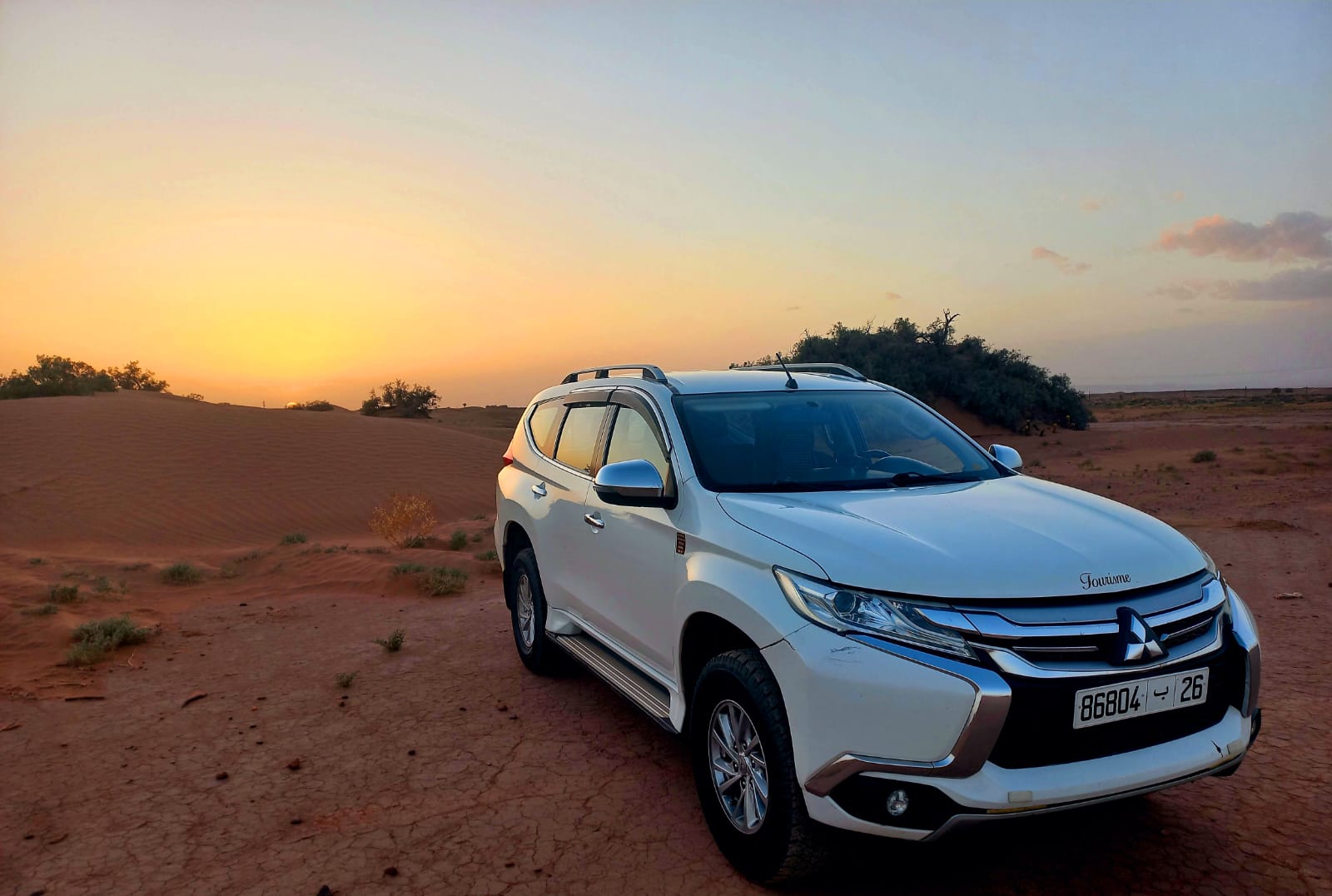 Professional Tour Vehicle at Desert Sunset