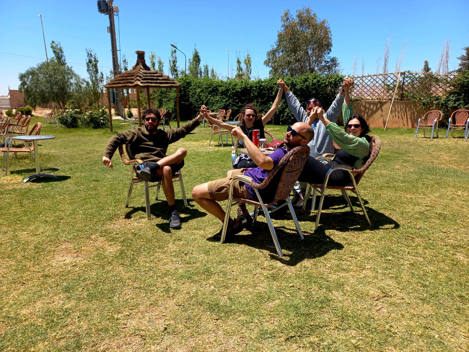 Tourists Relaxing in Traditional Garden