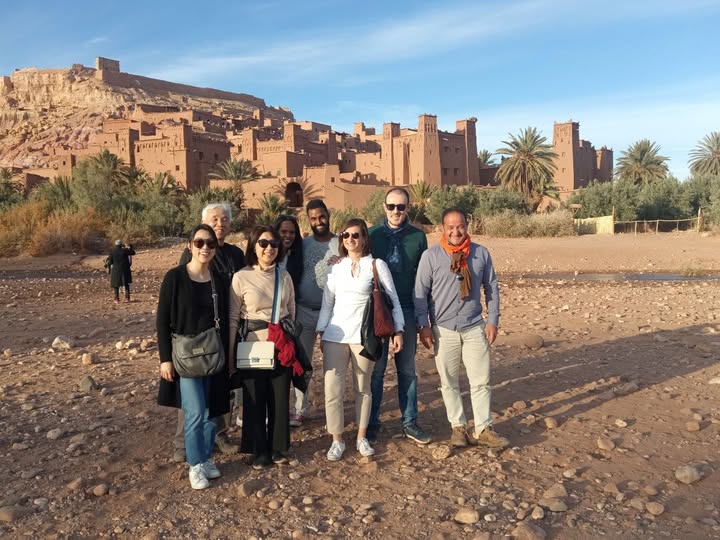 Mouhcine Ezzaouya with satisfied tourists